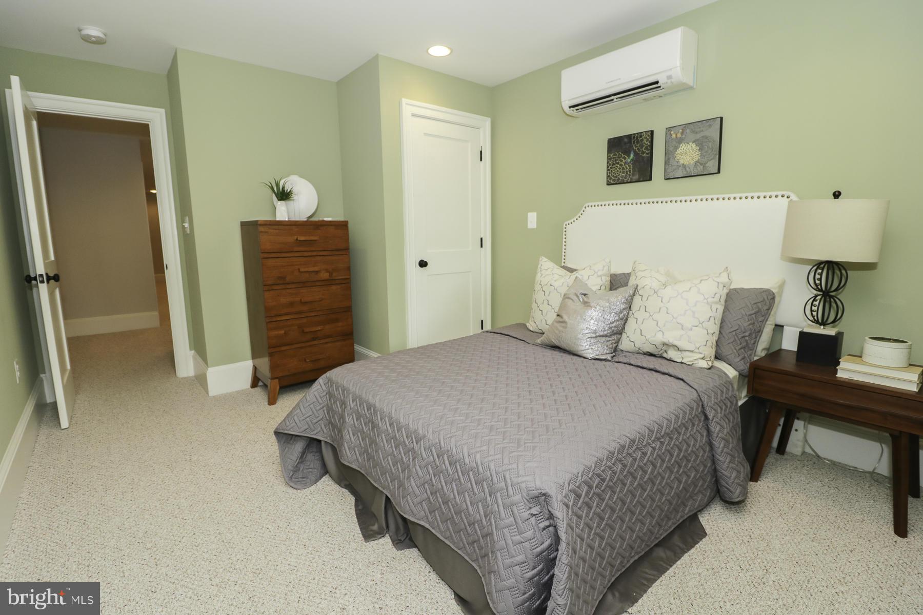 124 11th Street Northeast Washington, DC 20002 - Photo 28 of 30 a bedroom with a bed and a desk