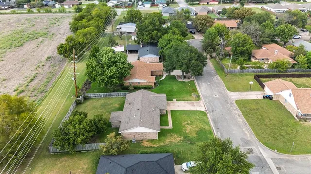 an aerial view of a house with outdoor space lake view and lake view