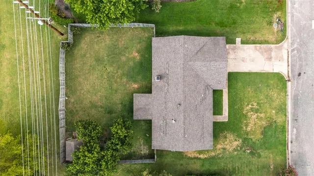 an aerial view of a house having yard