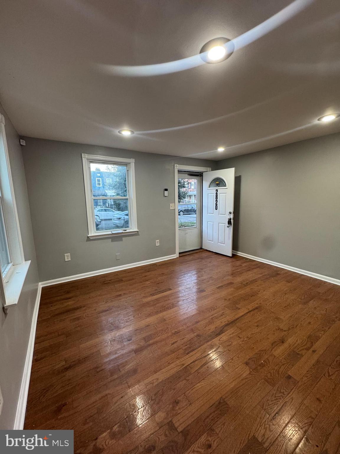 2820 Bookert Drive Baltimore, MD 21225 - Photo 3 of 12 Hardwood floors and neutral paint