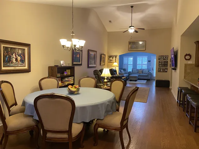 a view of a dining room with furniture