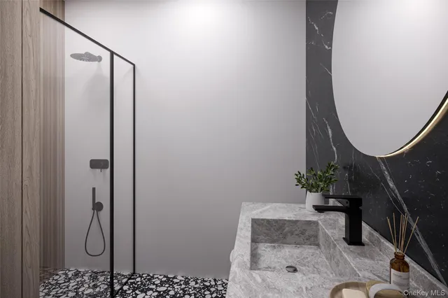 a bathroom with a sink vanity and mirror