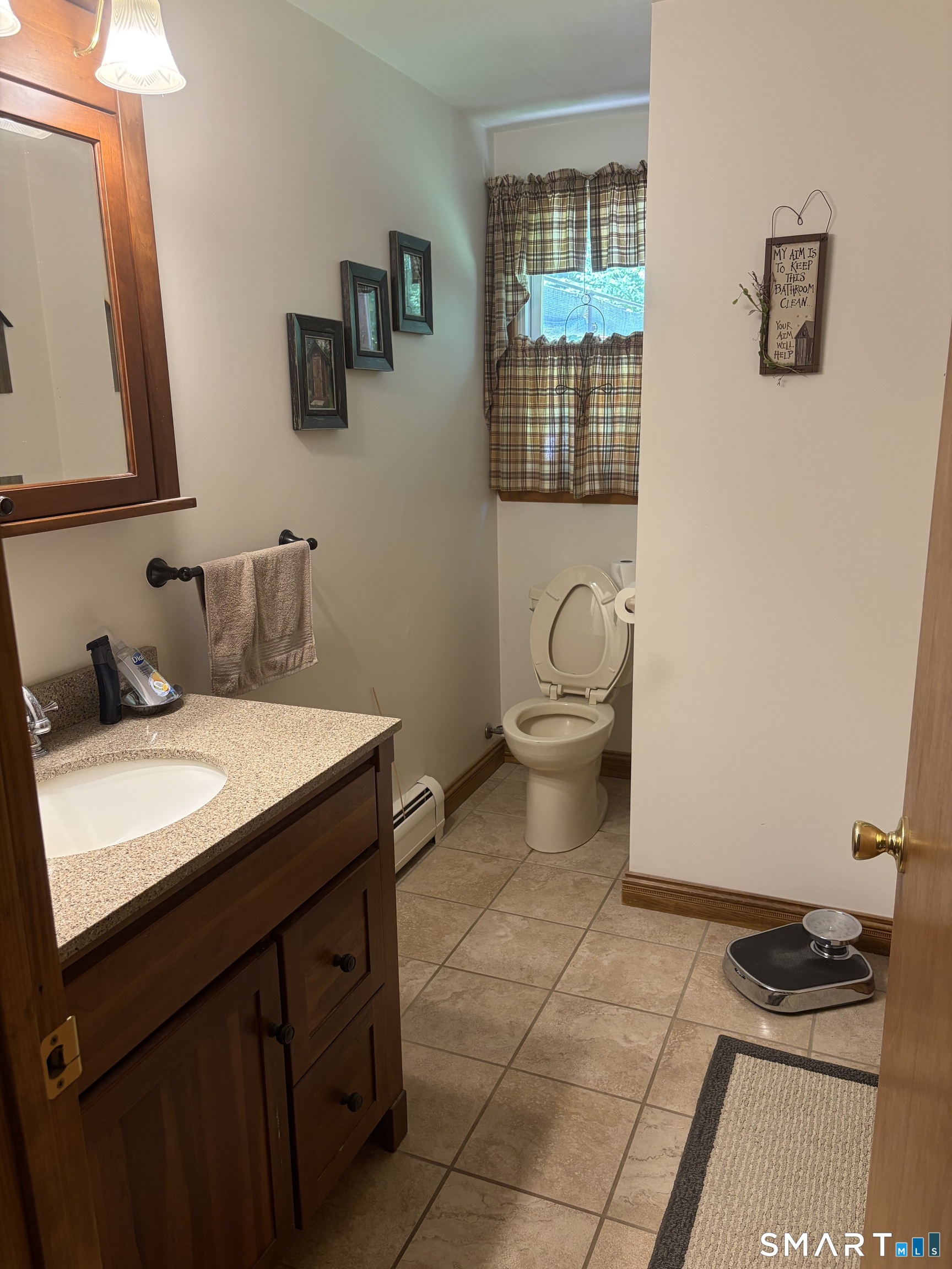 109 Village Hill Road Willington, CT 06279 - Photo 21 of 22 a bathroom with a granite countertop sink and a mirror