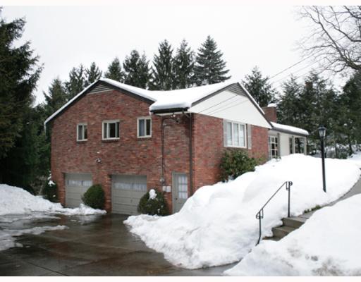 421 Sangree Road Pittsburgh, PA 15237 - Photo 15 of 18 Exterior Front. Concrete driveway leads to an extra large two car garage, with man door.