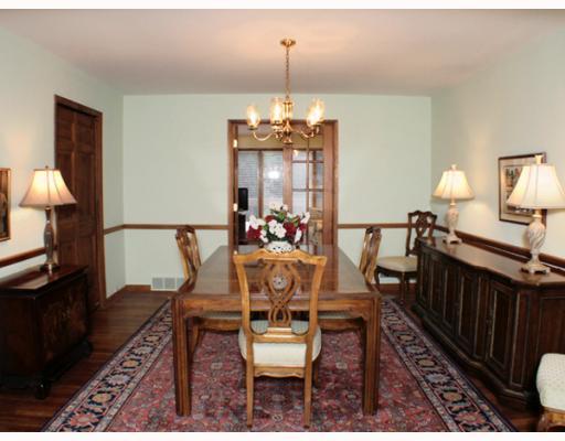 421 Sangree Road Pittsburgh, PA 15237 - Photo 4 of 18 Dining Room. Hardwod flooring, chair rail, open to living room. Closet in dining room has access to a floored attic.
