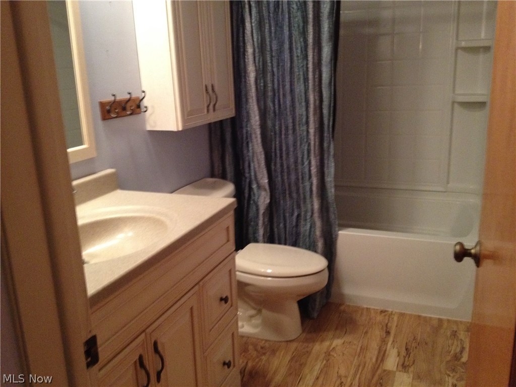 632 Miner Road Cleveland, OH 44143 - Photo 7 of 20 Remodeled full bath with laminate flooring