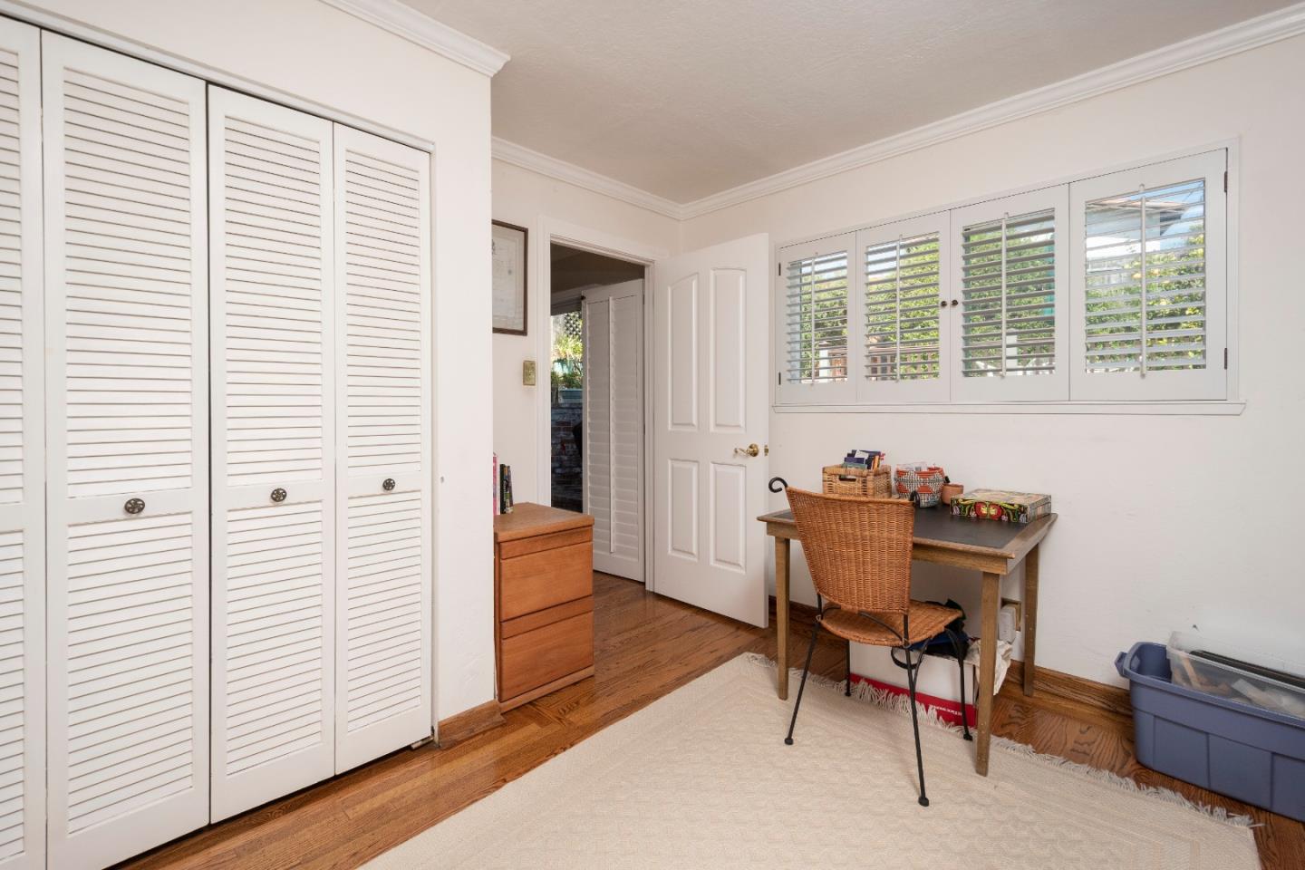 9 La Mancha Place Millbrae, CA 94030 - Photo 11 of 20 a view of a workspace with furniture and a window