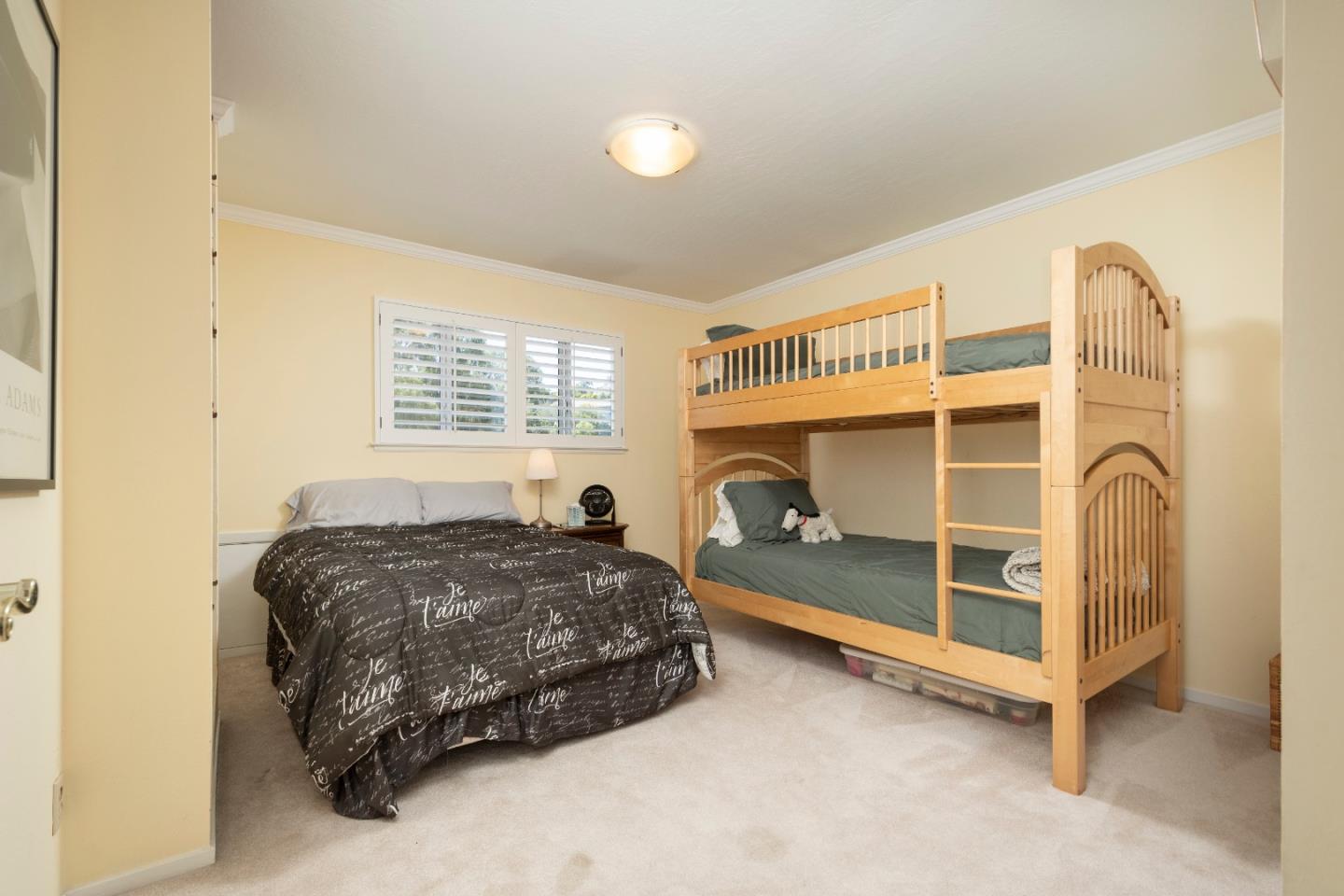 9 La Mancha Place Millbrae, CA 94030 - Photo 15 of 20 a bedroom with a bed and a window