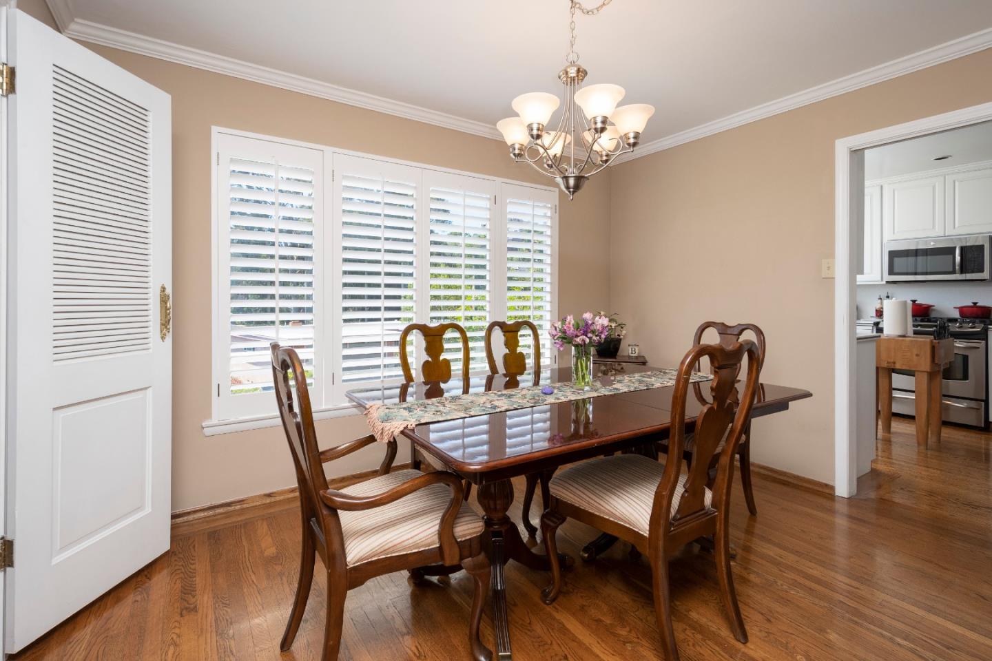 9 La Mancha Place Millbrae, CA 94030 - Photo 4 of 20 a view of a dining room with furniture window and wooden floor
