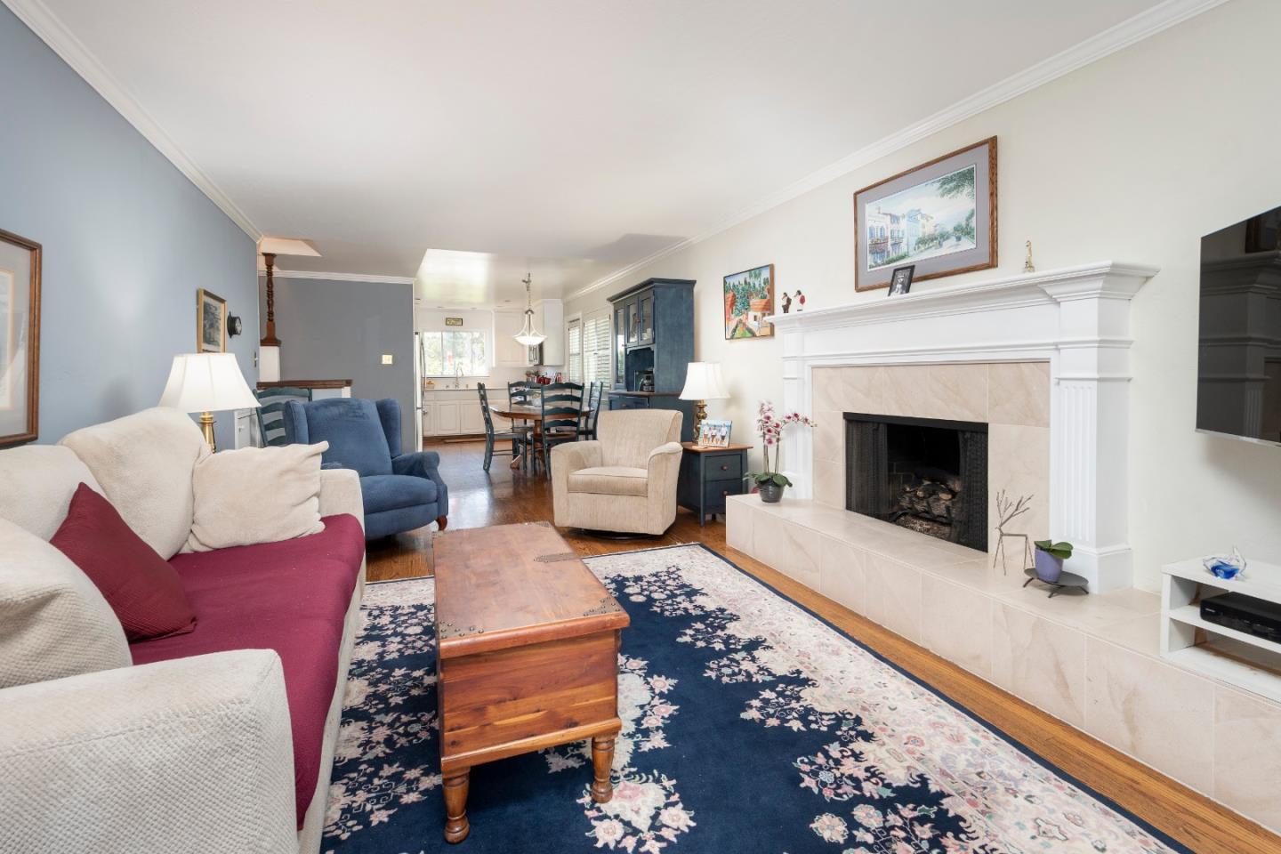 9 La Mancha Place Millbrae, CA 94030 - Photo 8 of 20 a living room with furniture fireplace and window
