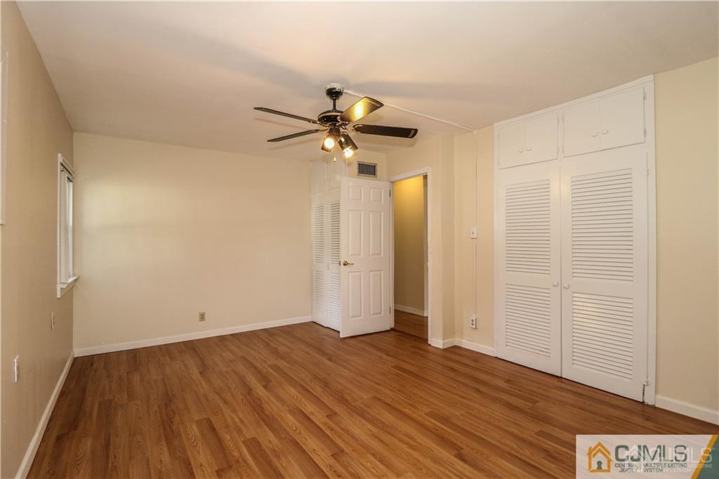20 Sturgis Road Edison, NJ 08817 - Photo 16 of 25 wooden floor in an empty room