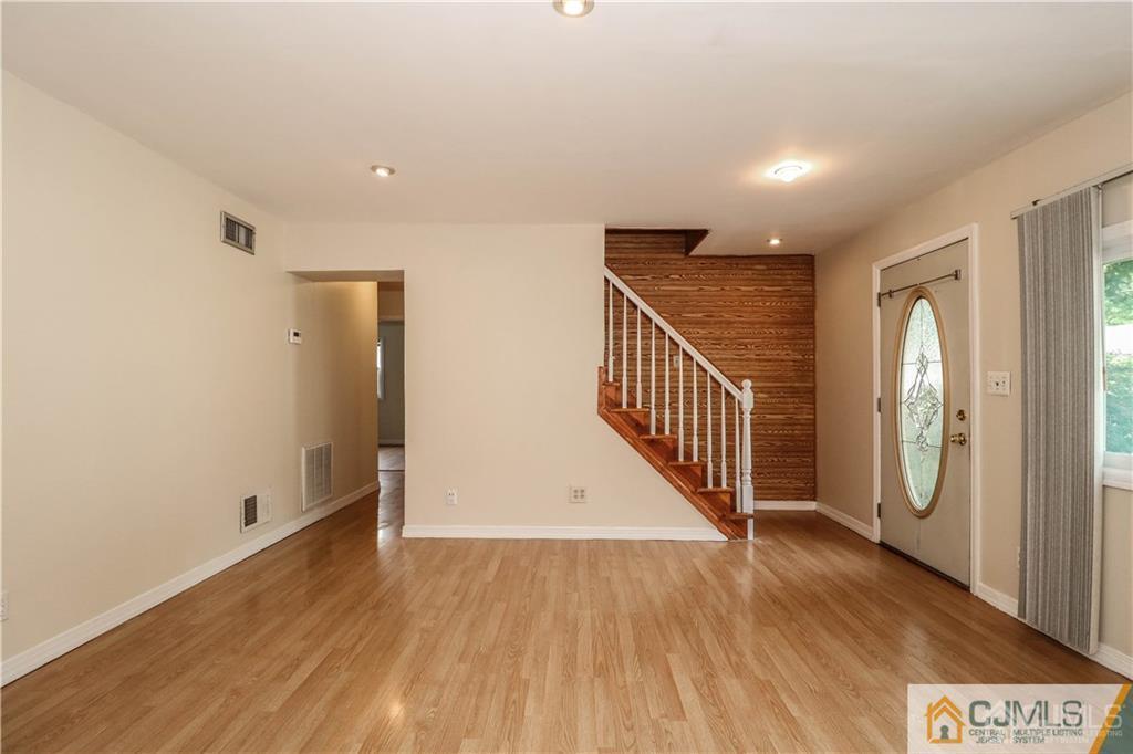 20 Sturgis Road Edison, NJ 08817 - Photo 3 of 25 a view of a hallway with staircase
