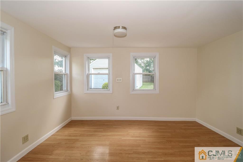 20 Sturgis Road Edison, NJ 08817 - Photo 4 of 25 a view of an empty room with window