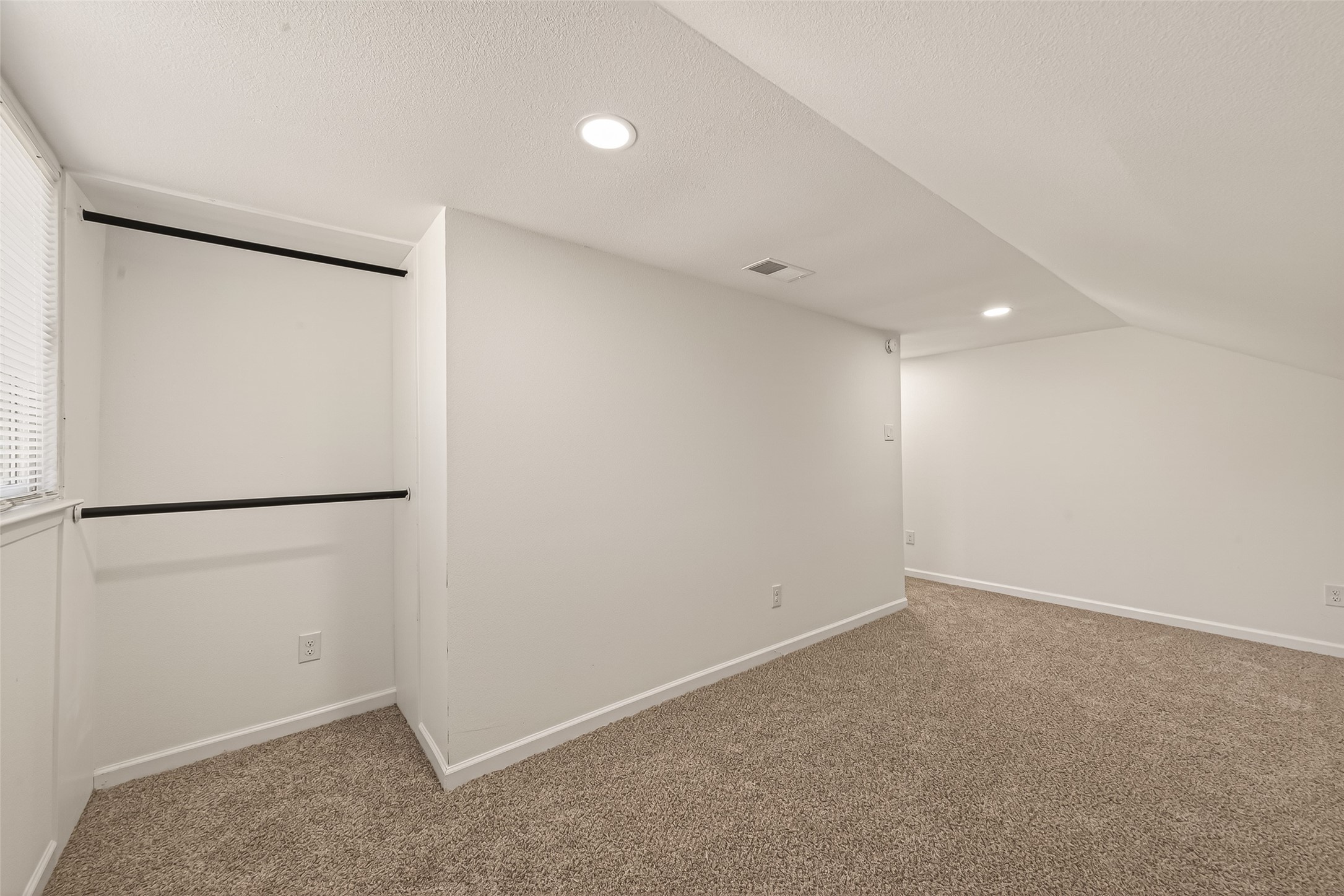 2915 Whispering Springs Drive Spring, TX 77373 - Photo 25 of 36 Spacious upstairs loft with plush carpet—perfect for a second living area, game room, or flex space.