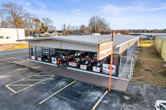 a view of a swimming pool with seating area