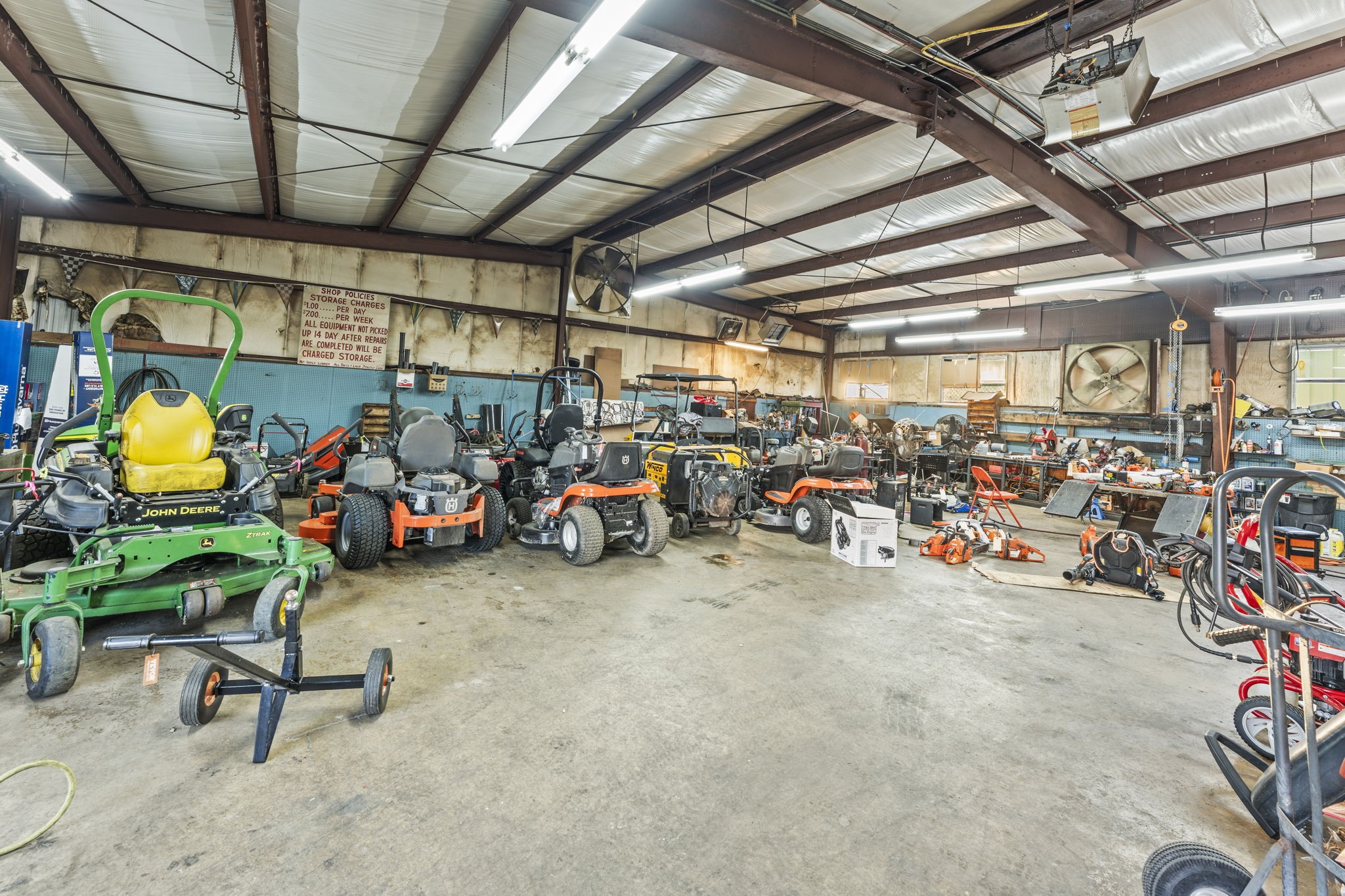918 South College Street Winchester, TN 37398 - Photo 23 of 44 a view of a garage with a bike and a car