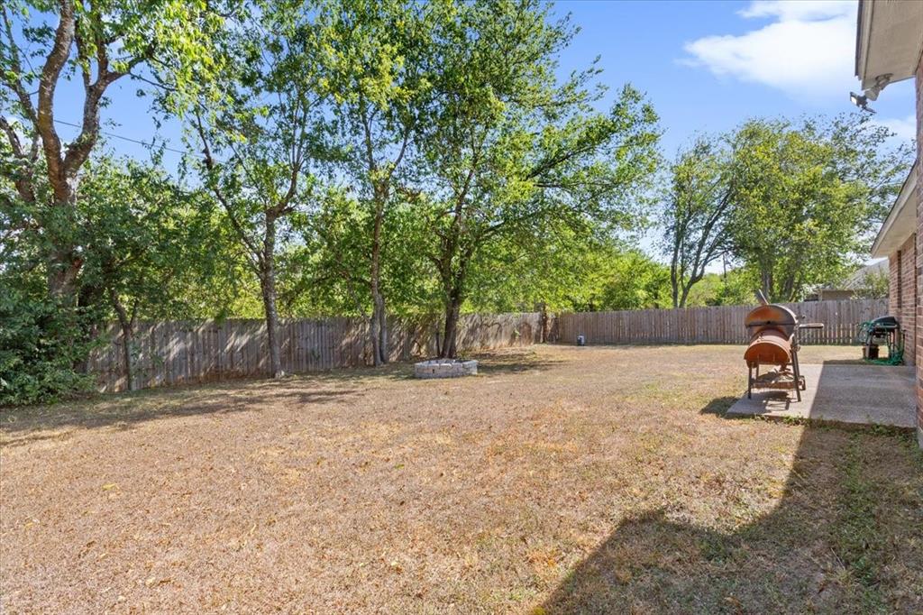 736 Tahoe Trail Hewitt, TX 76643 - Photo 27 of 30 Fenced backyard with a patio