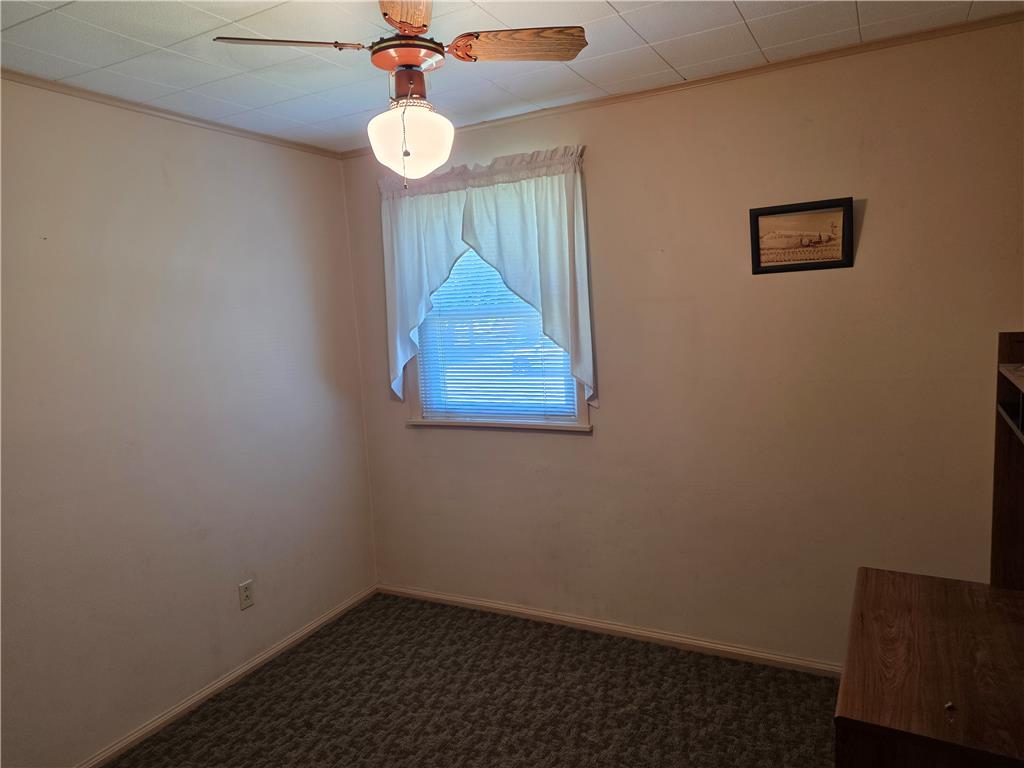 3134 Roxford Road Allentown, PA 18103 - Photo 24 of 34 A cozy bedroom features soft lighting and textured carpeting, ideal for a peaceful retreat.