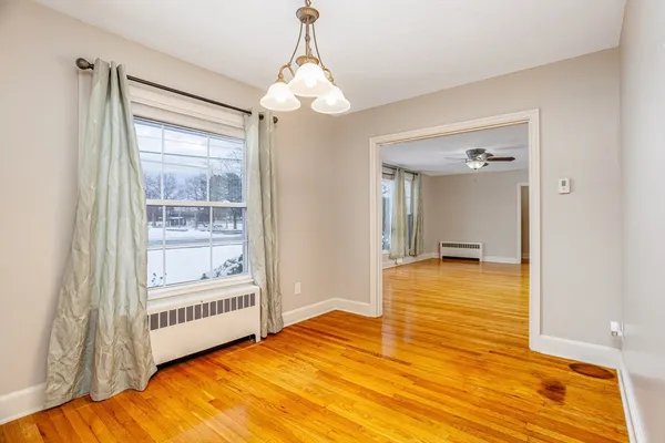 a view of livingroom with wooden floor