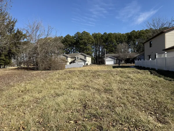 a view of a yard with an outdoor space