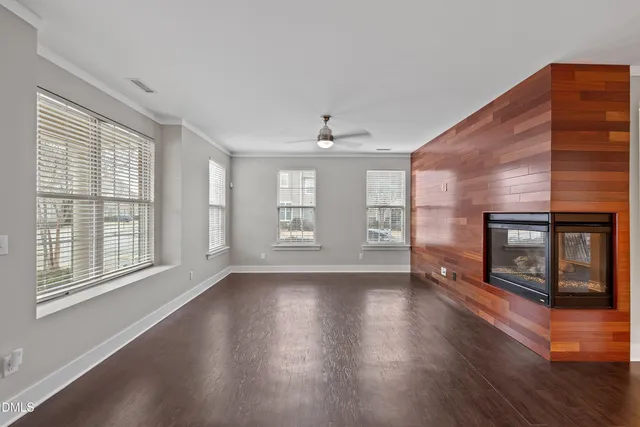 a kitchen with stainless steel appliances granite countertop a sink refrigerator and microwave