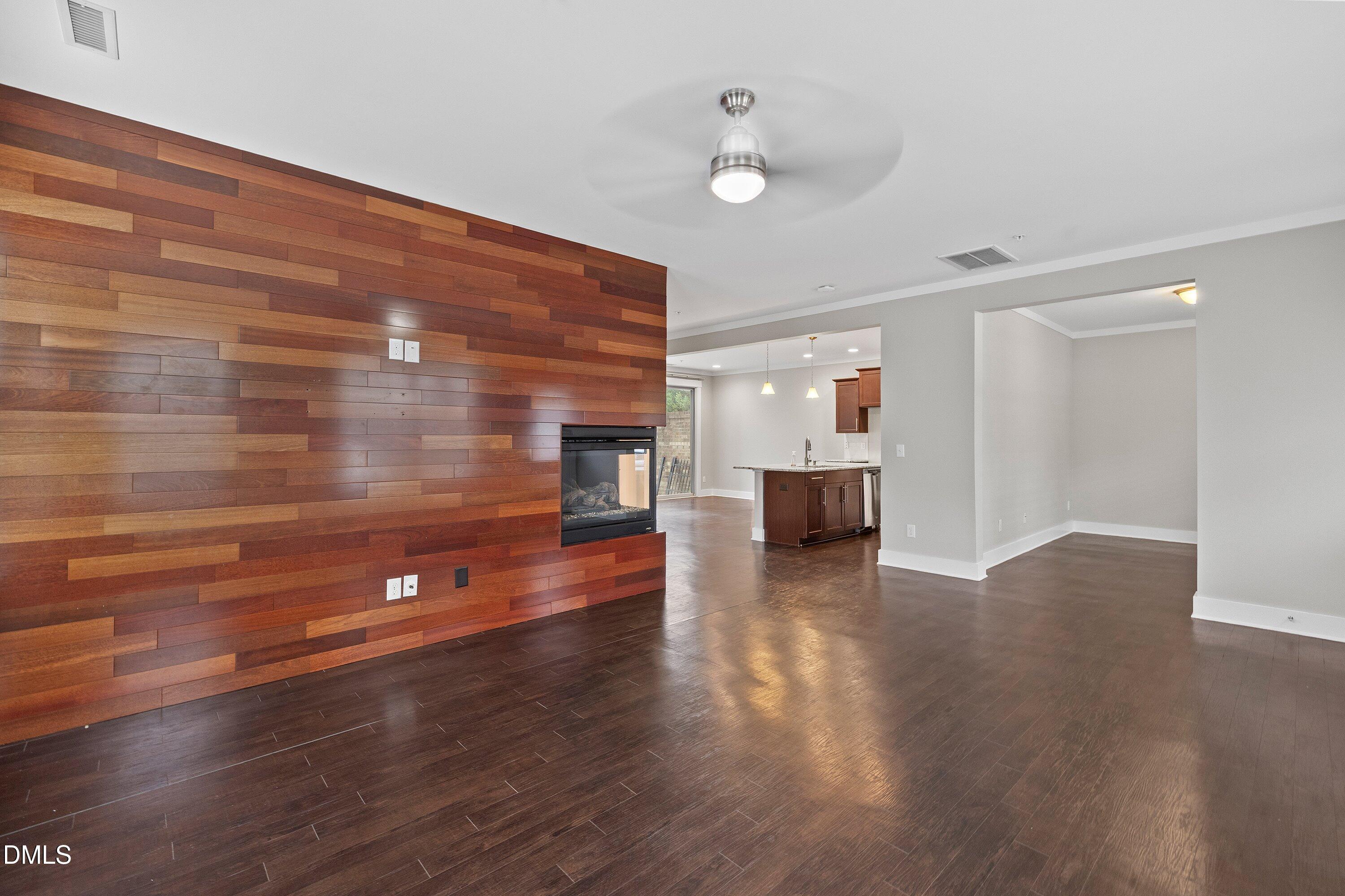 9903 Remedios Walk Raleigh, NC 27617 - Photo 12 of 53 a view of empty room with wooden floor