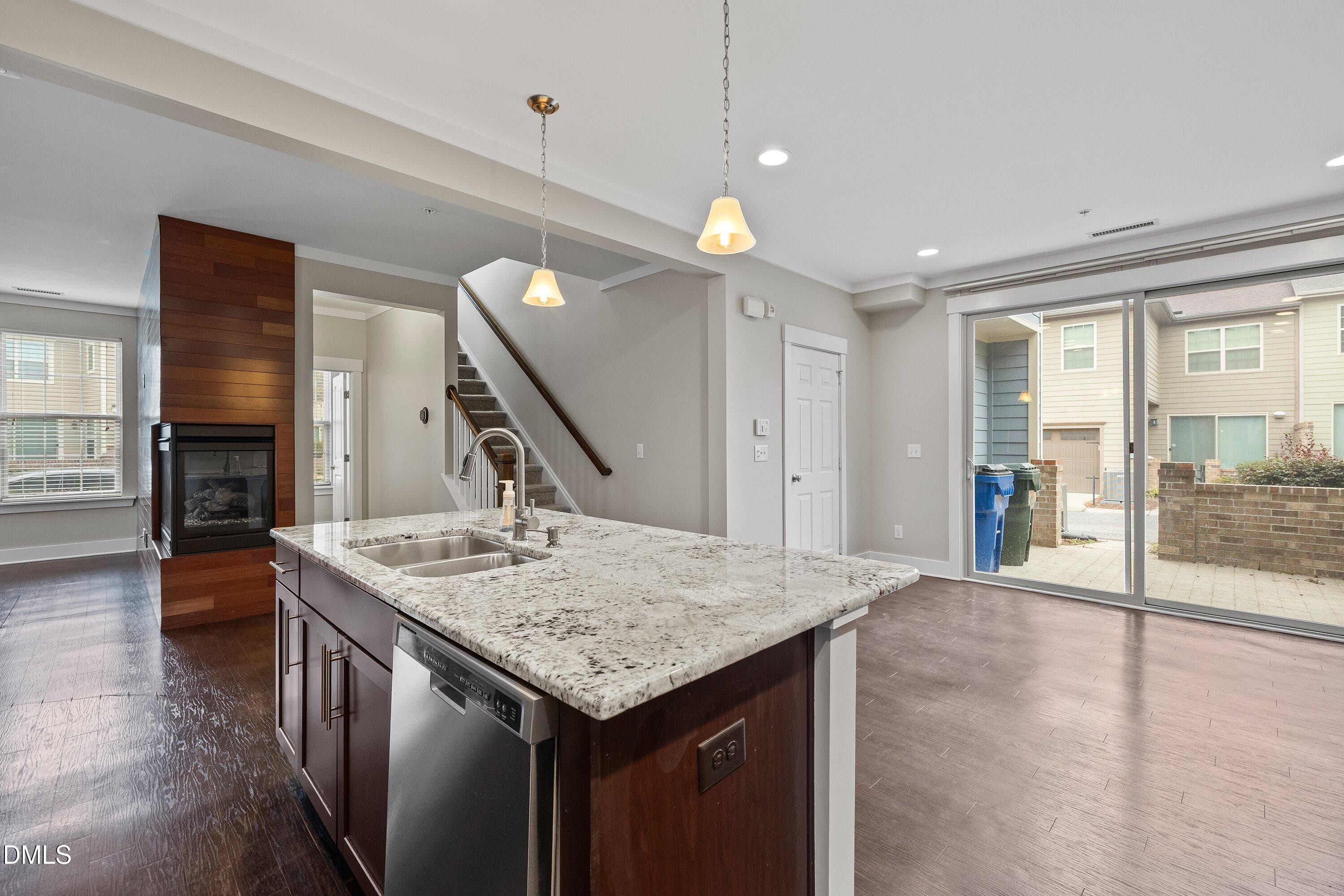 9903 Remedios Walk Raleigh, NC 27617 - Photo 20 of 53 a kitchen with a table and chairs