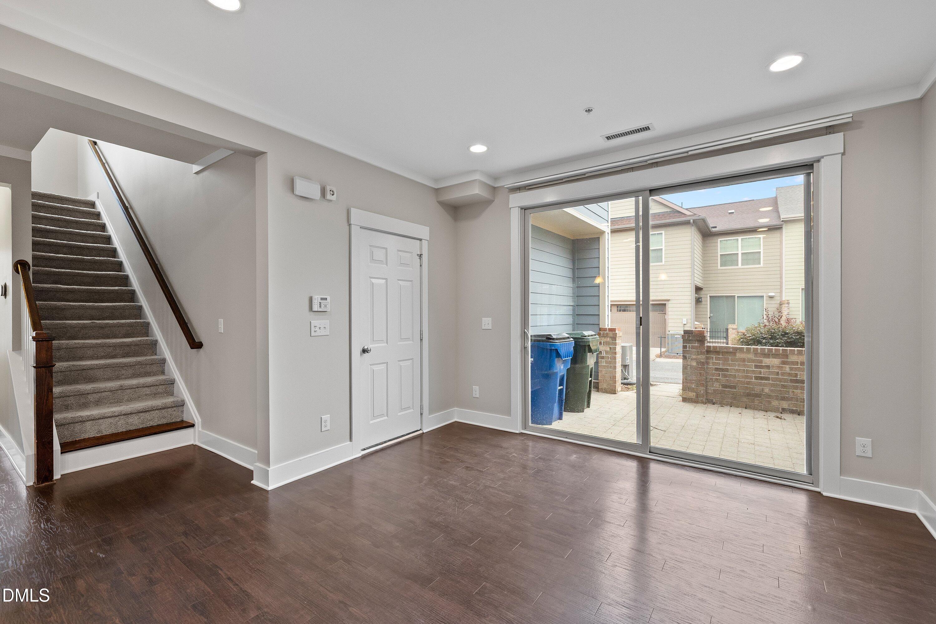 9903 Remedios Walk Raleigh, NC 27617 - Photo 21 of 53 a view of an entryway with wooden floor