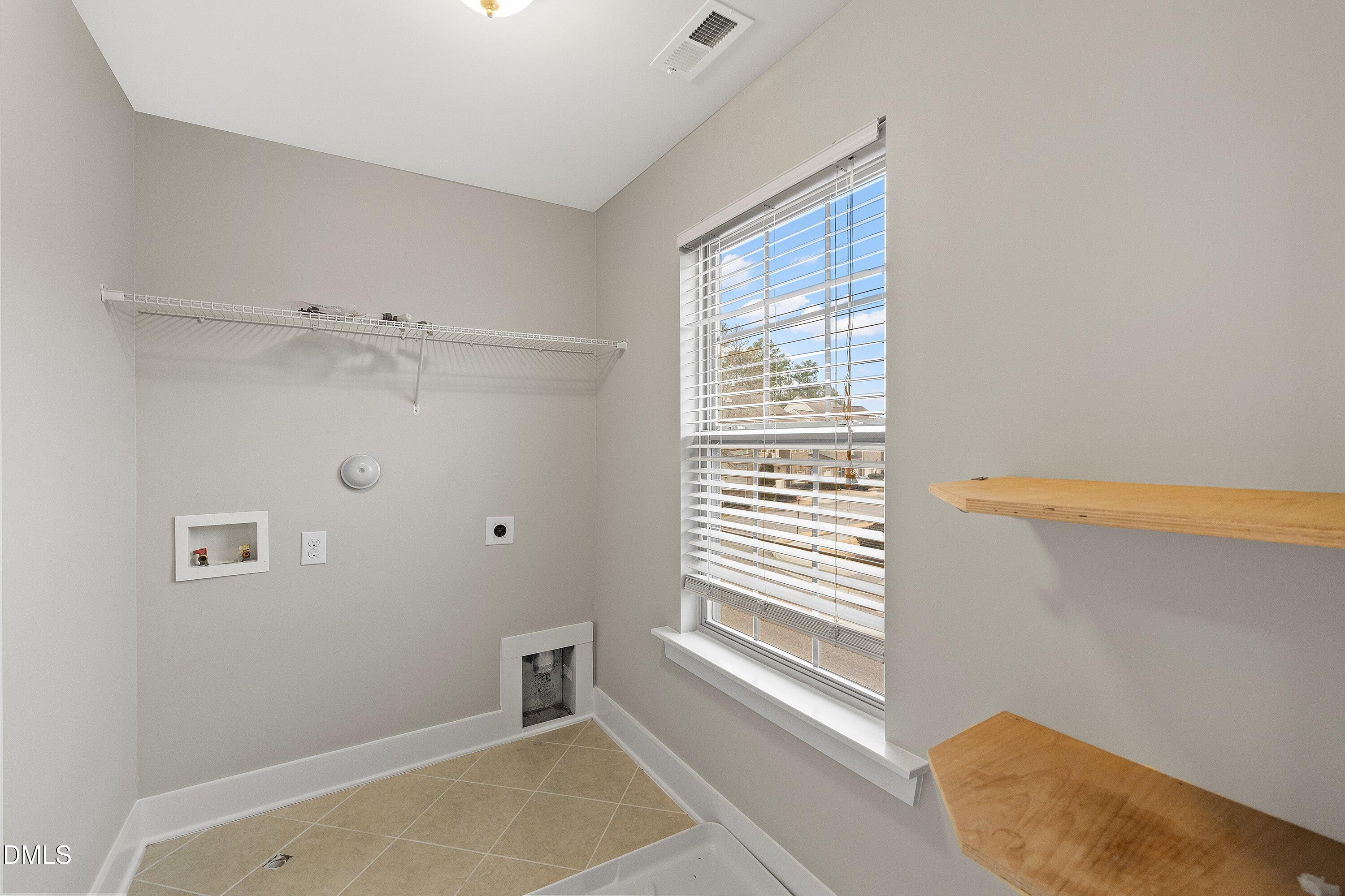 9903 Remedios Walk Raleigh, NC 27617 - Photo 24 of 53 a view of an empty room with a window