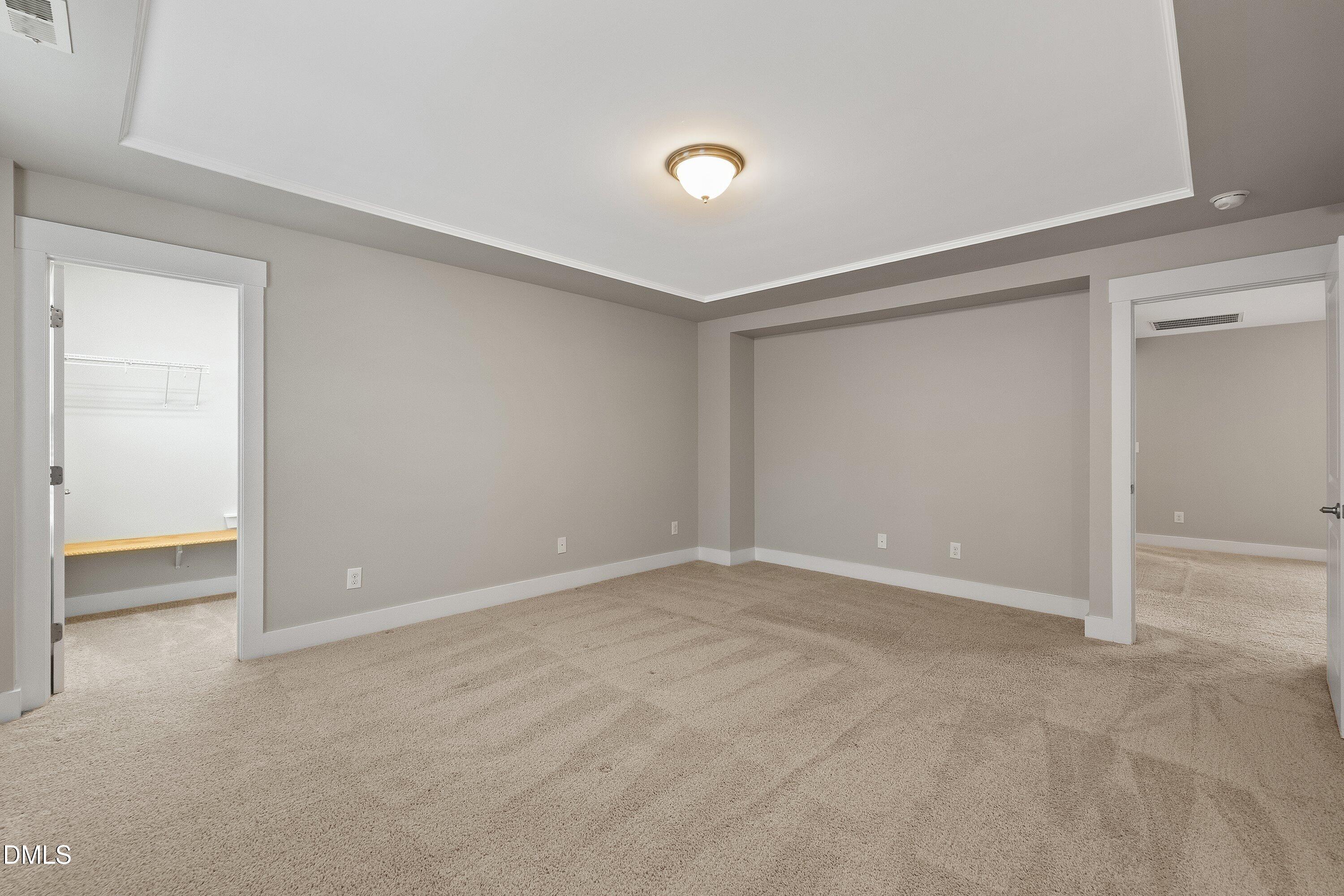 9903 Remedios Walk Raleigh, NC 27617 - Photo 32 of 53 a view of an empty room