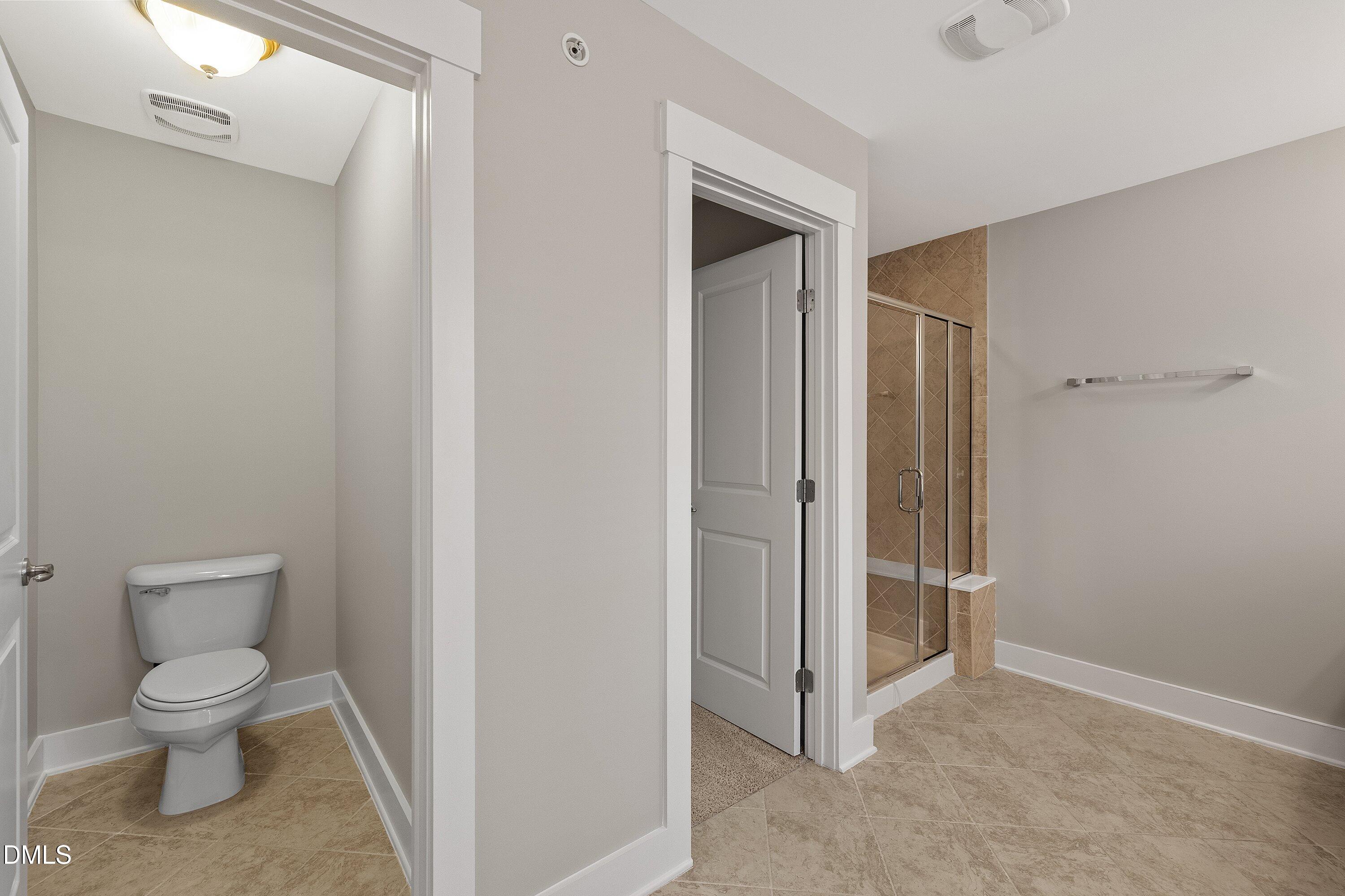 9903 Remedios Walk Raleigh, NC 27617 - Photo 34 of 53 a view of bathroom with a toilet