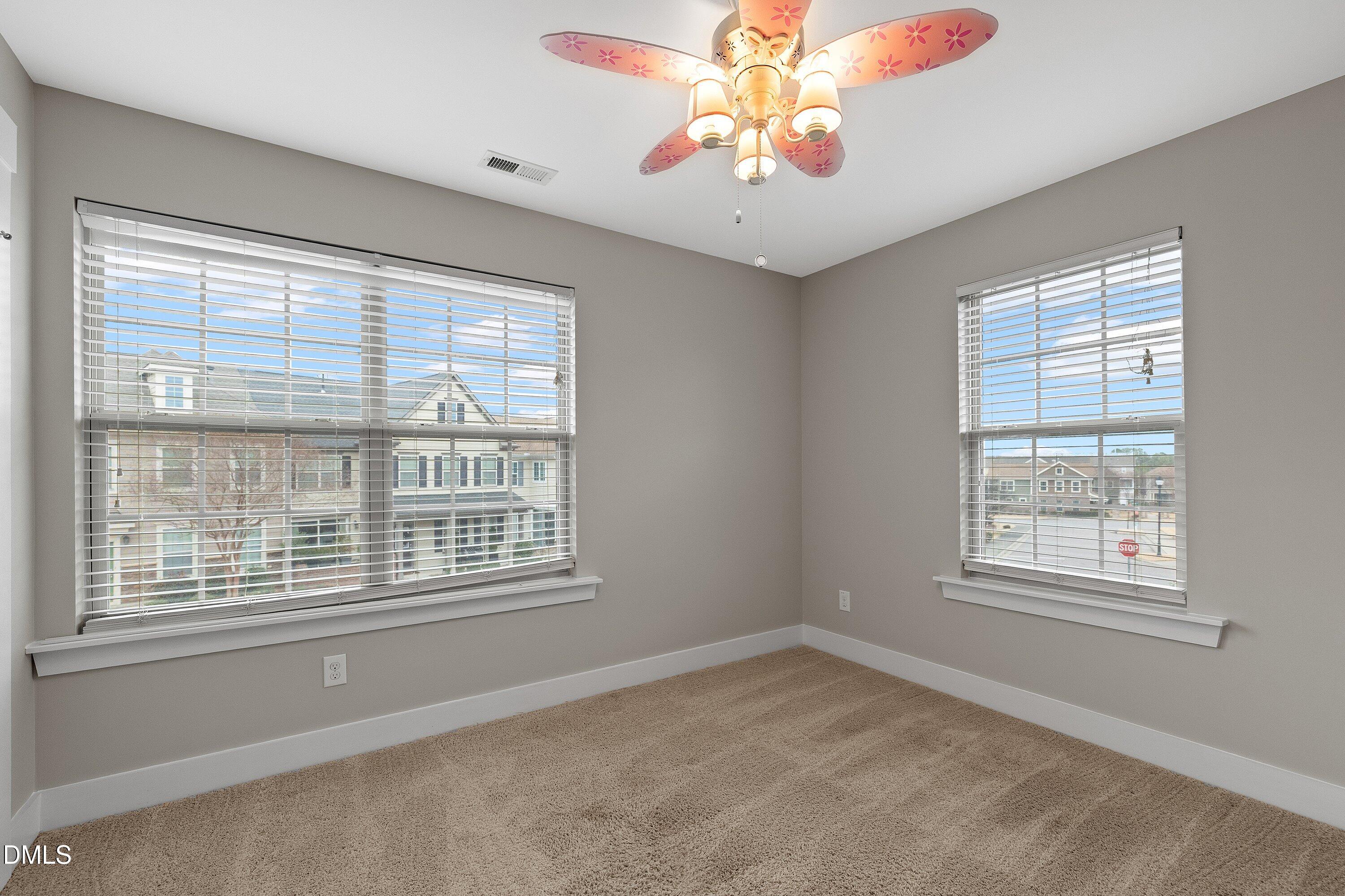 9903 Remedios Walk Raleigh, NC 27617 - Photo 40 of 53 a view of an empty room with a window