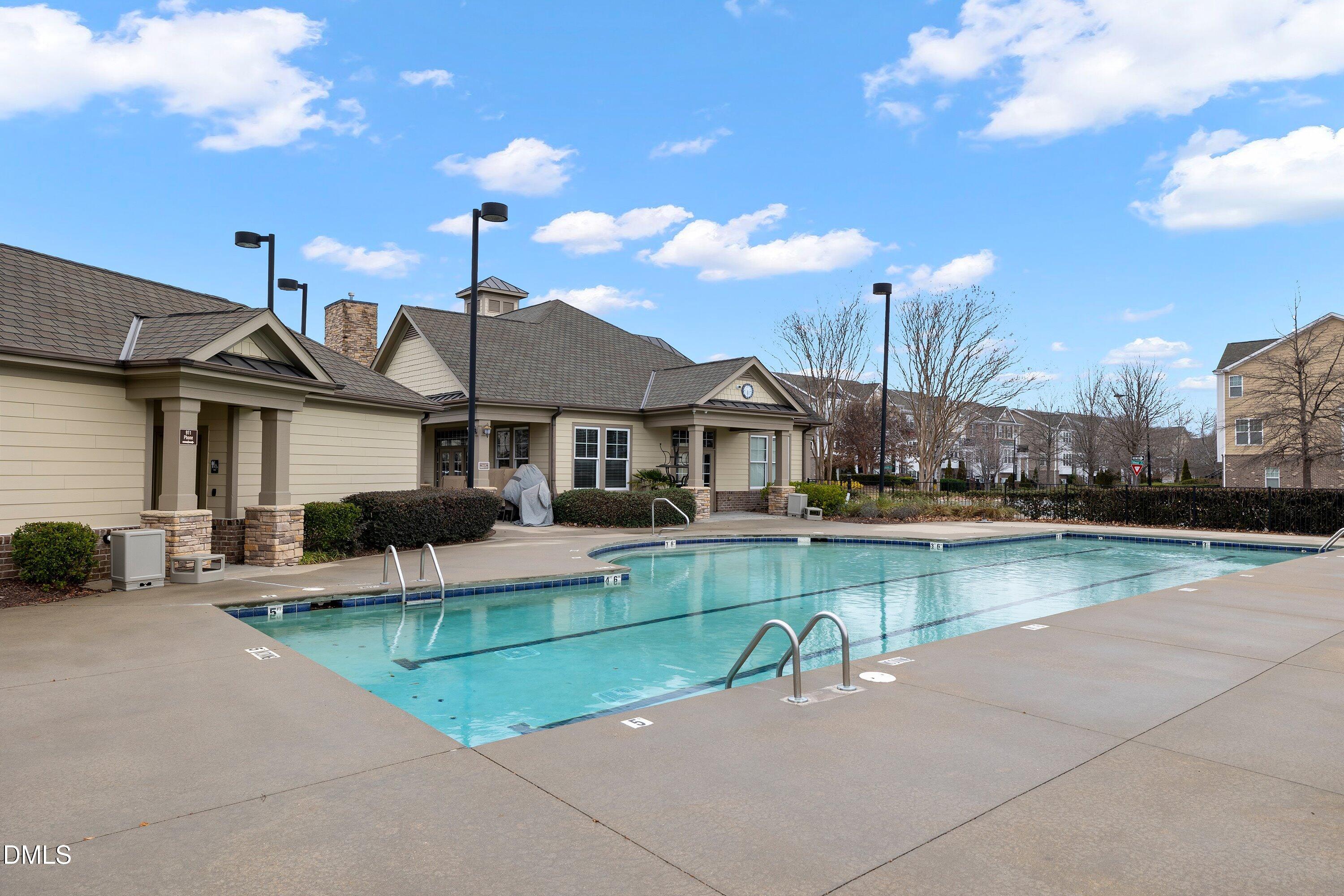 9903 Remedios Walk Raleigh, NC 27617 - Photo 49 of 53 a view of a house with swimming pool and sitting area