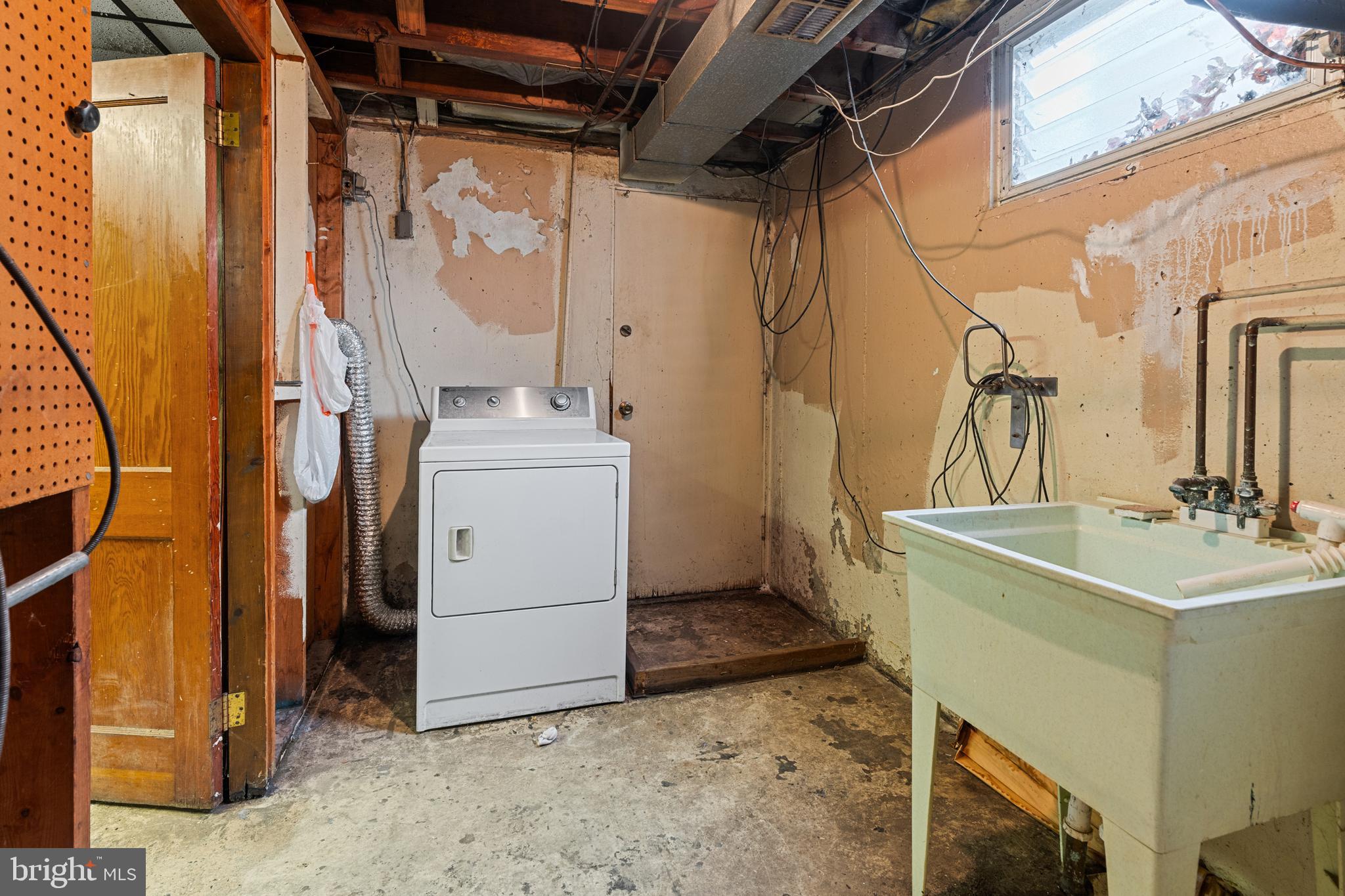 1614 Blackrock Road Swarthmore, PA 19081 - Photo 16 of 31 a utility room with a washer and dryer