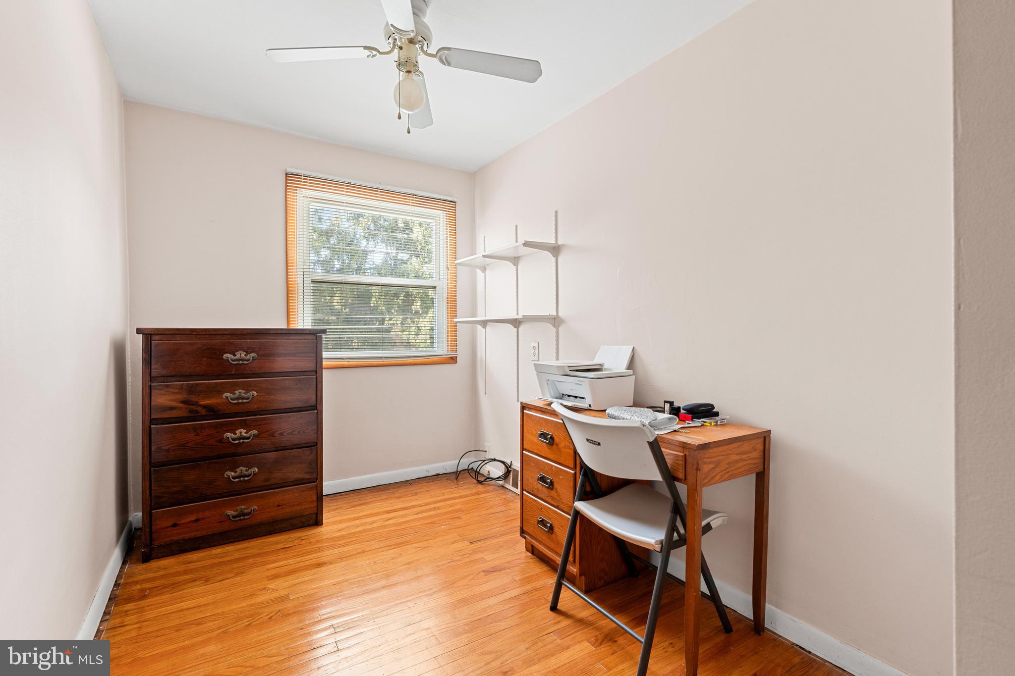 1614 Blackrock Road Swarthmore, PA 19081 - Photo 18 of 31 a view of a workspace with furniture and a window