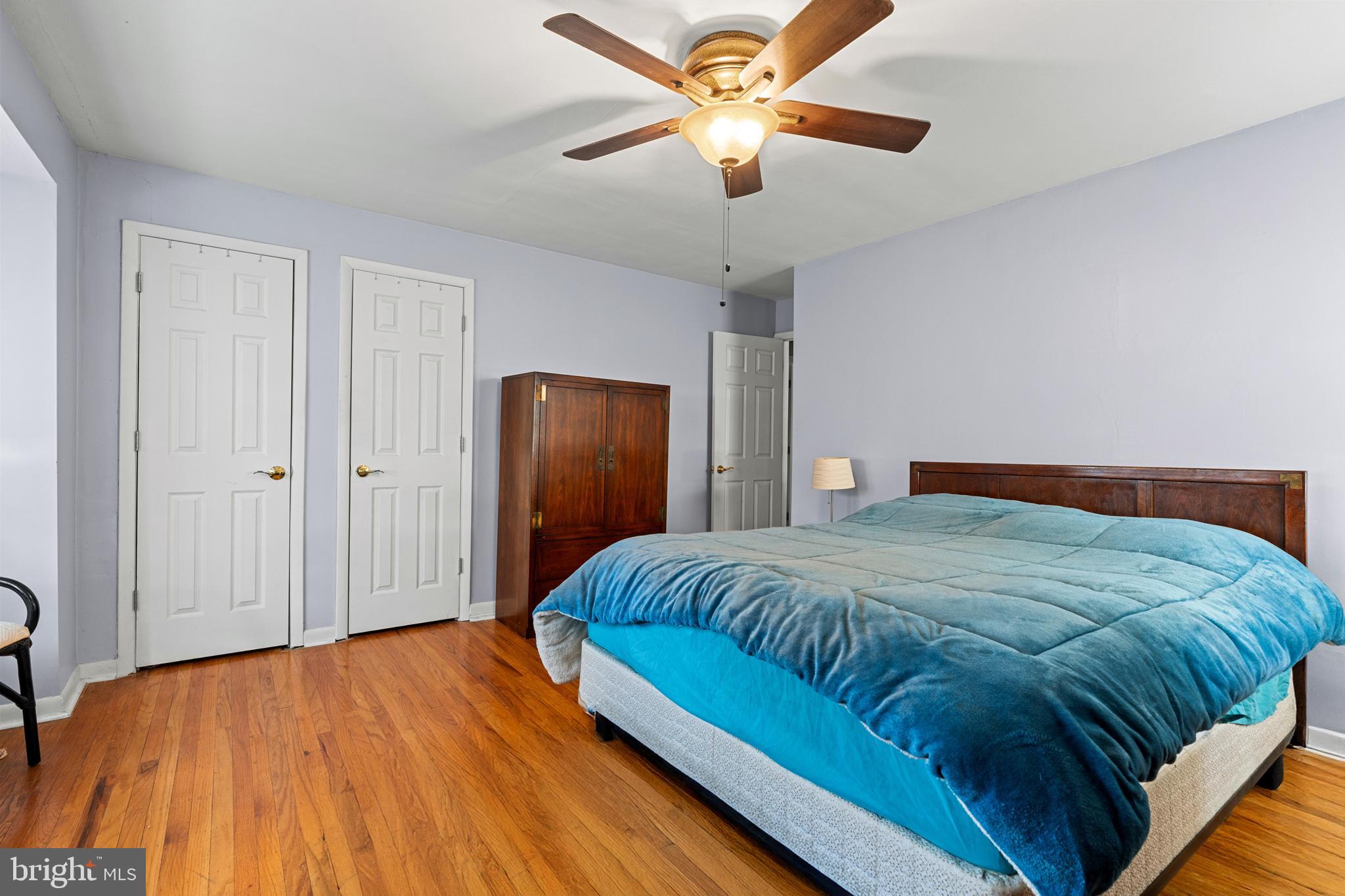 1614 Blackrock Road Swarthmore, PA 19081 - Photo 24 of 31 a bedroom with a bed and a chandelier