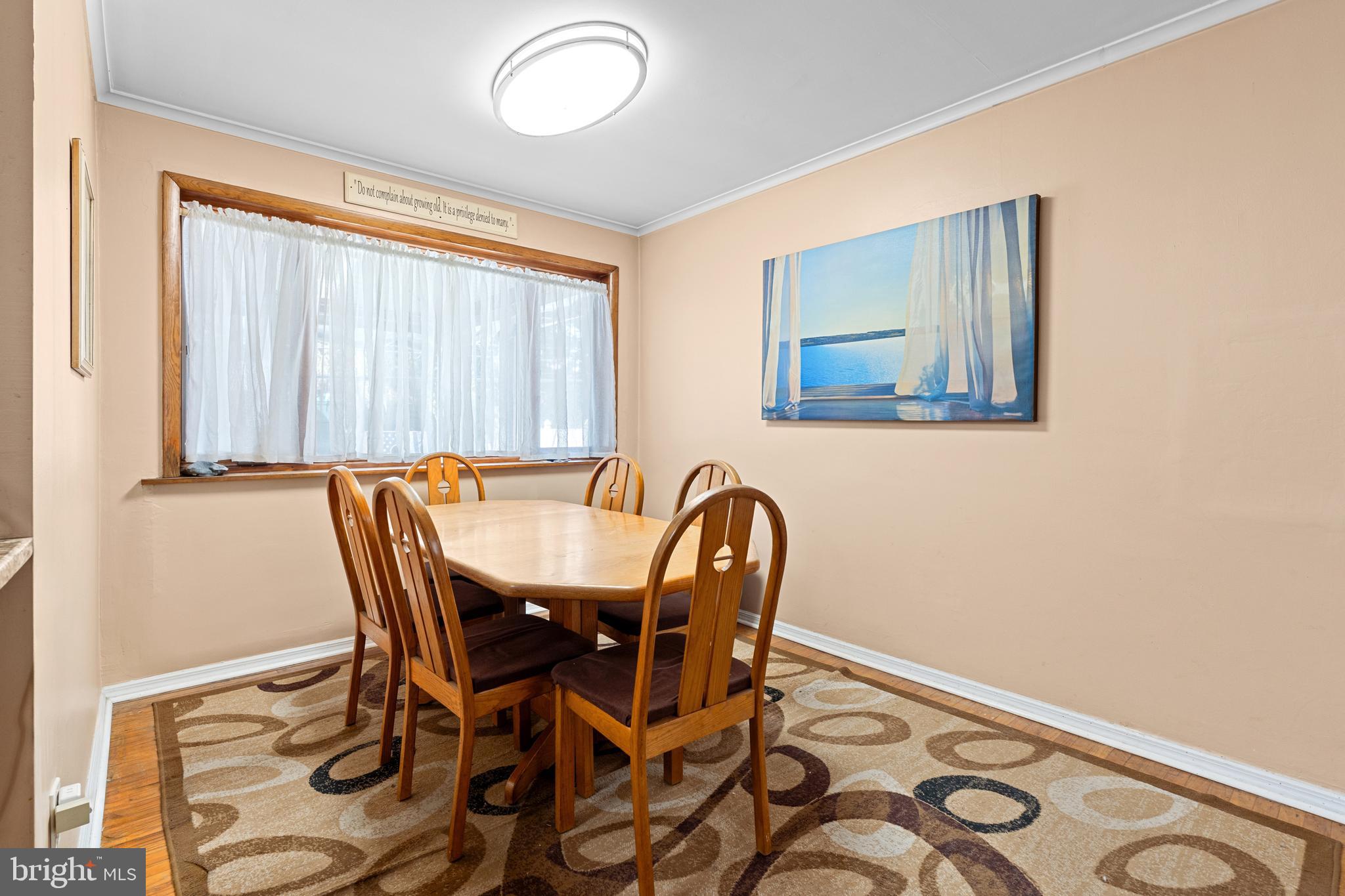 1614 Blackrock Road Swarthmore, PA 19081 - Photo 8 of 31 a view of a dining room with furniture and a window
