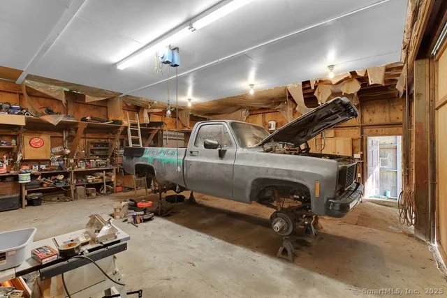 a view of parking garage with cars