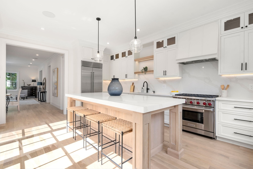 41 Waverly Street Brookline, MA 02445 - Photo 1 of 38 a kitchen with a stove a sink and a refrigerator
