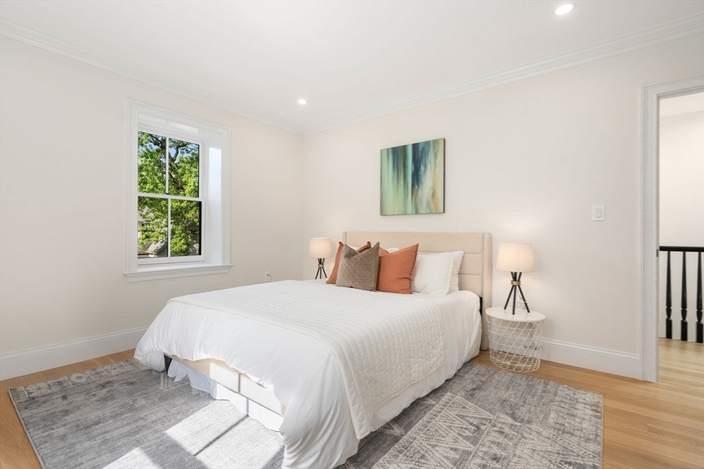 41 Waverly Street Brookline, MA 02445 - Photo 21 of 38 a bedroom with a bed and a window