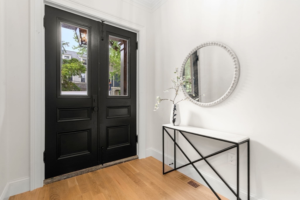 41 Waverly Street Brookline, MA 02445 - Photo 31 of 38 a view of a livingroom with furniture and a window