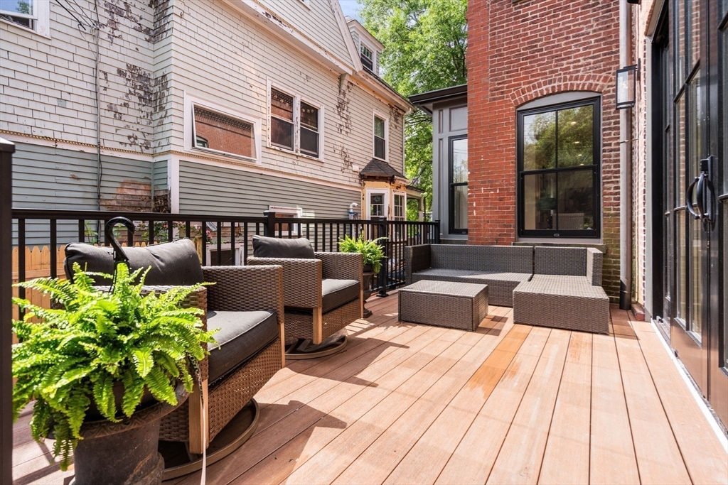 41 Waverly Street Brookline, MA 02445 - Photo 5 of 38 a front view of a house with patio