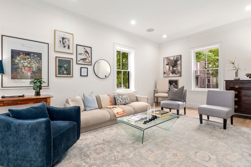 41 Waverly Street Brookline, MA 02445 - Photo 7 of 38 a living room with furniture and a large window
