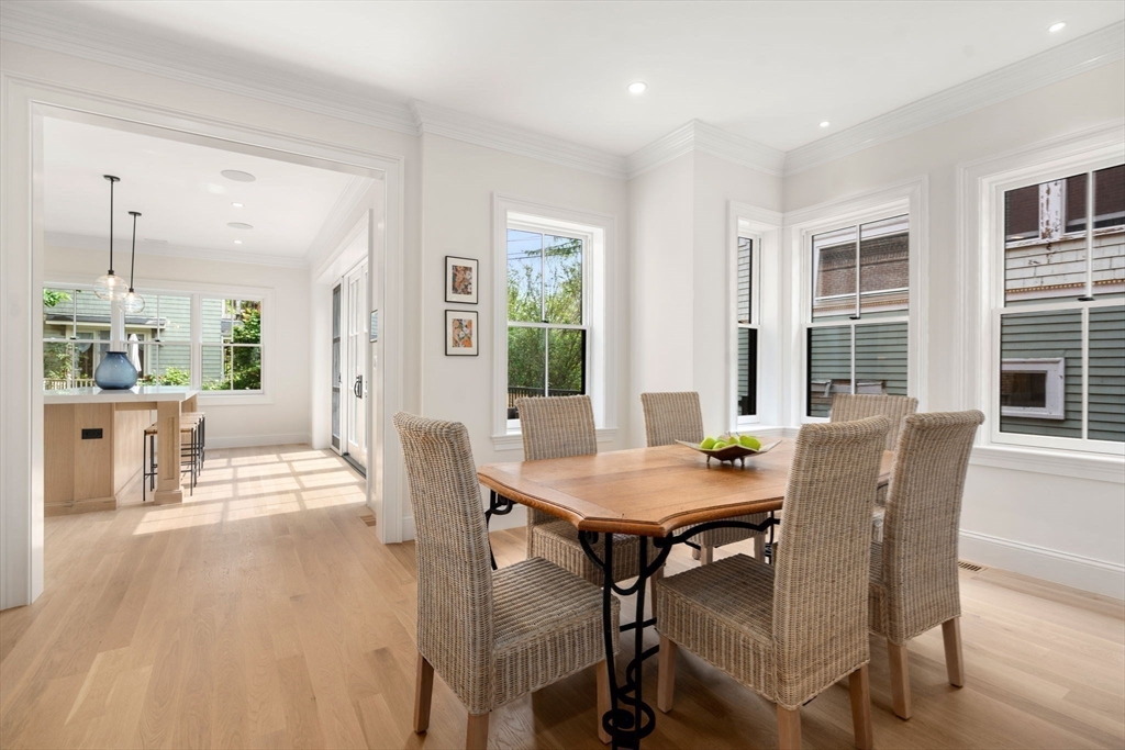 41 Waverly Street Brookline, MA 02445 - Photo 8 of 38 a view of a dining room with furniture and wooden floor