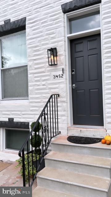 a view of entrance gate of the house
