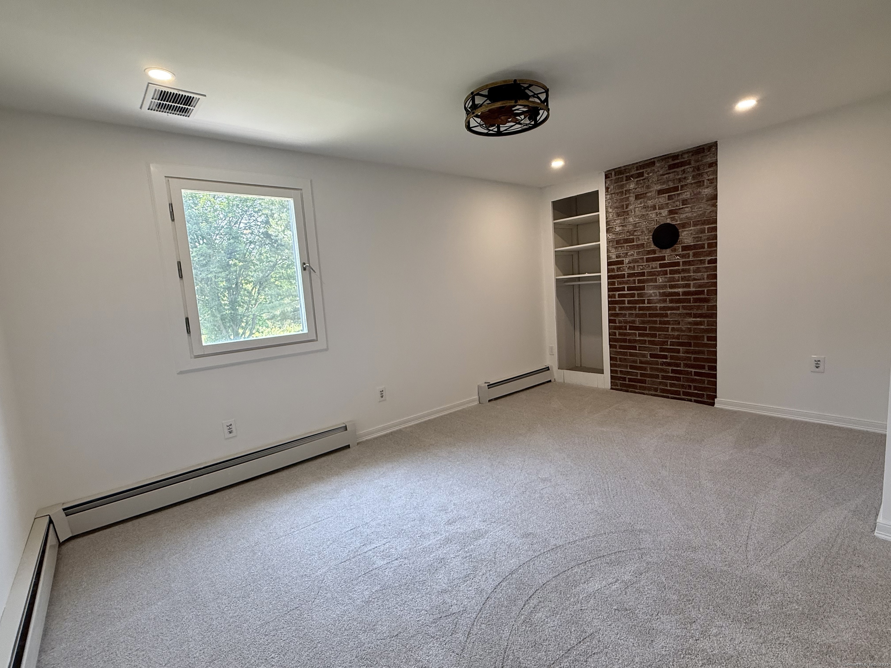 249 Wall Street Hebron, CT 06248 - Photo 20 of 28 a view of an empty room with a window