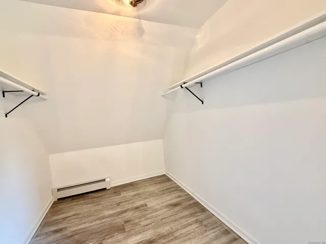 a view of small space with racks on the wall