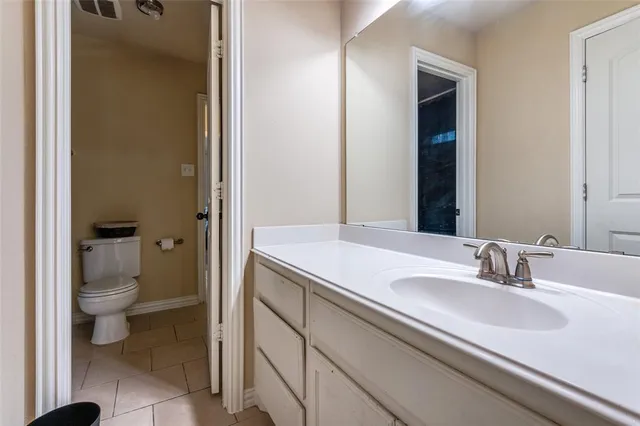 a bathroom with a sink and a toilet