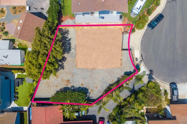 a view of a lake with a yard