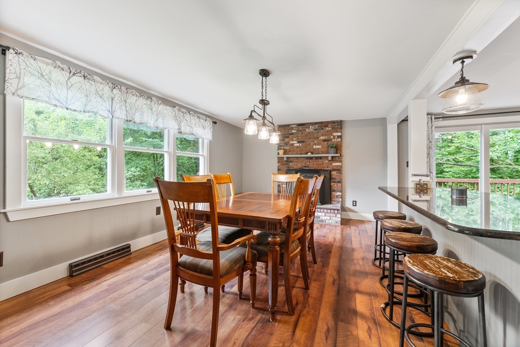 95 Ely Road Monson, MA 01057 - Photo 16 of 42 a view of a dining room with furniture window and outside view